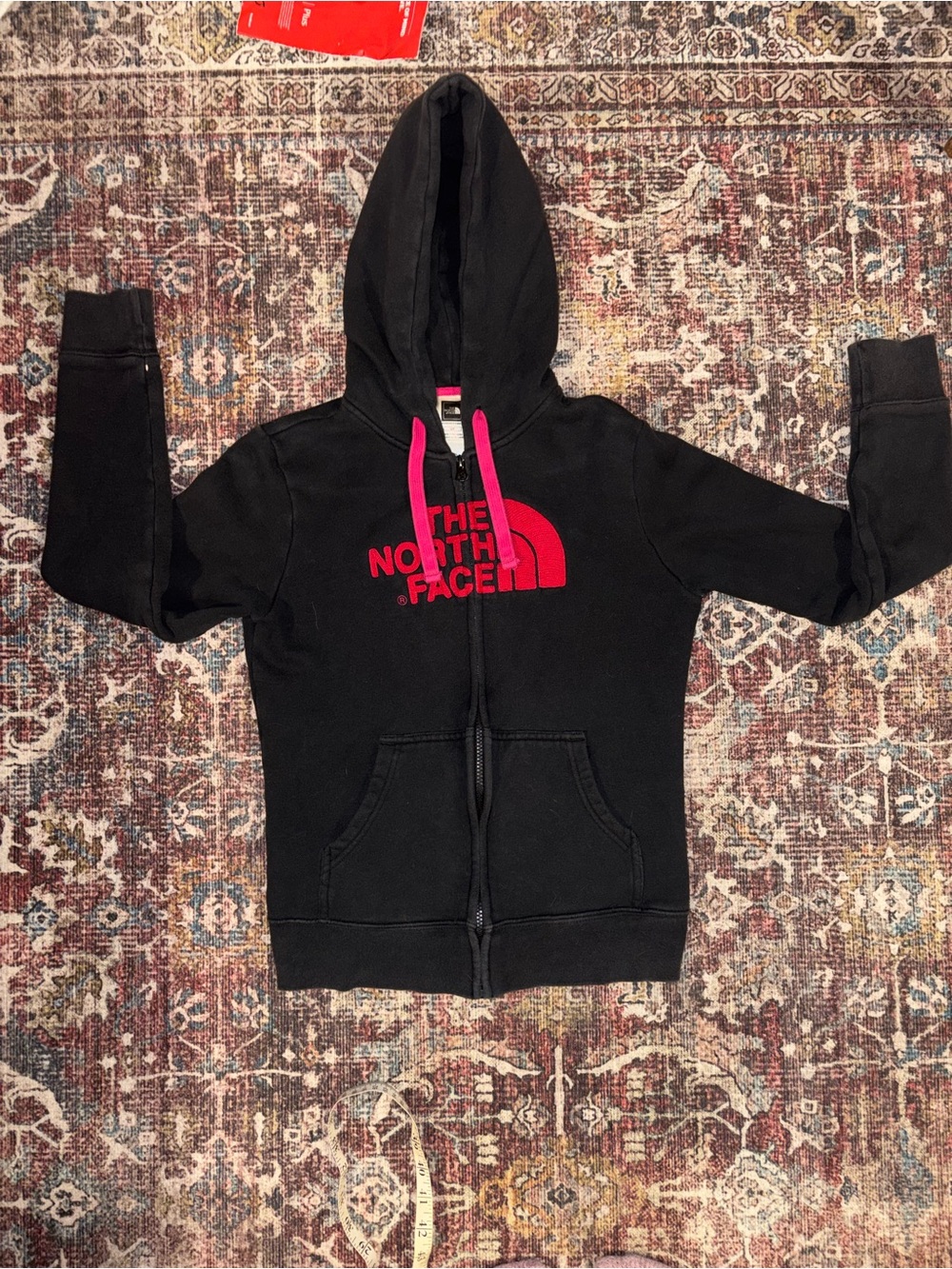 The North Face Black Hoodie with Pink Logo